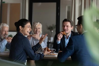 Employees enjoying a formal dinner party